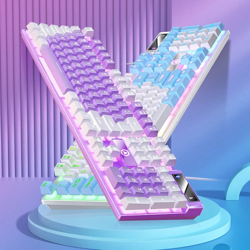 A close-up view of a pink and white wired low-profile gaming keyboard with a numeric keypad, displayed on a blue stand.