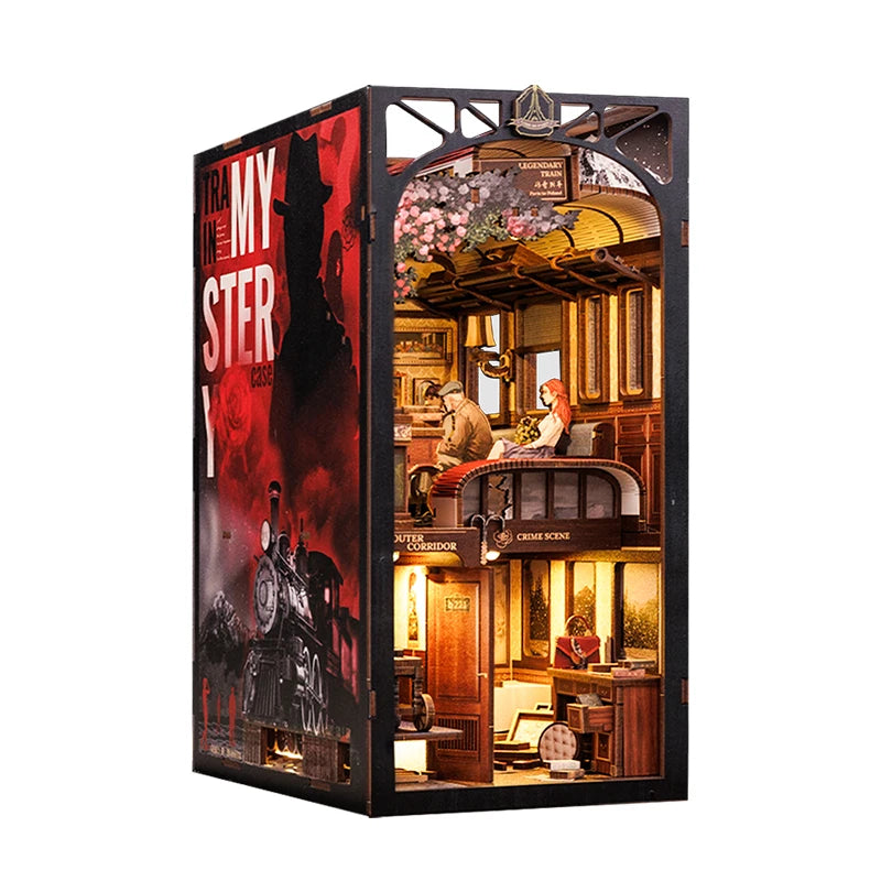 A wooden book nook kit featuring a detailed train interior scene with LED lighting.