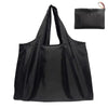 Black foldable nylon shopping tote bag with a handle and a separate pouch.