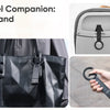 A portable phone stand featuring a magnetic clip and carabiner for hands-free travel.