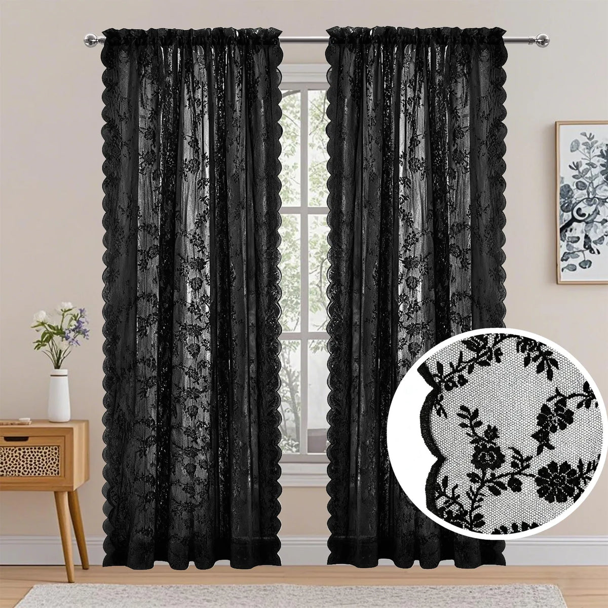 A pair of black vintage floral lace sheer curtains hanging in a window.