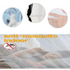 Close-up view of an elegant lace canopy mosquito net for indoor use, showing the fabric texture and design.