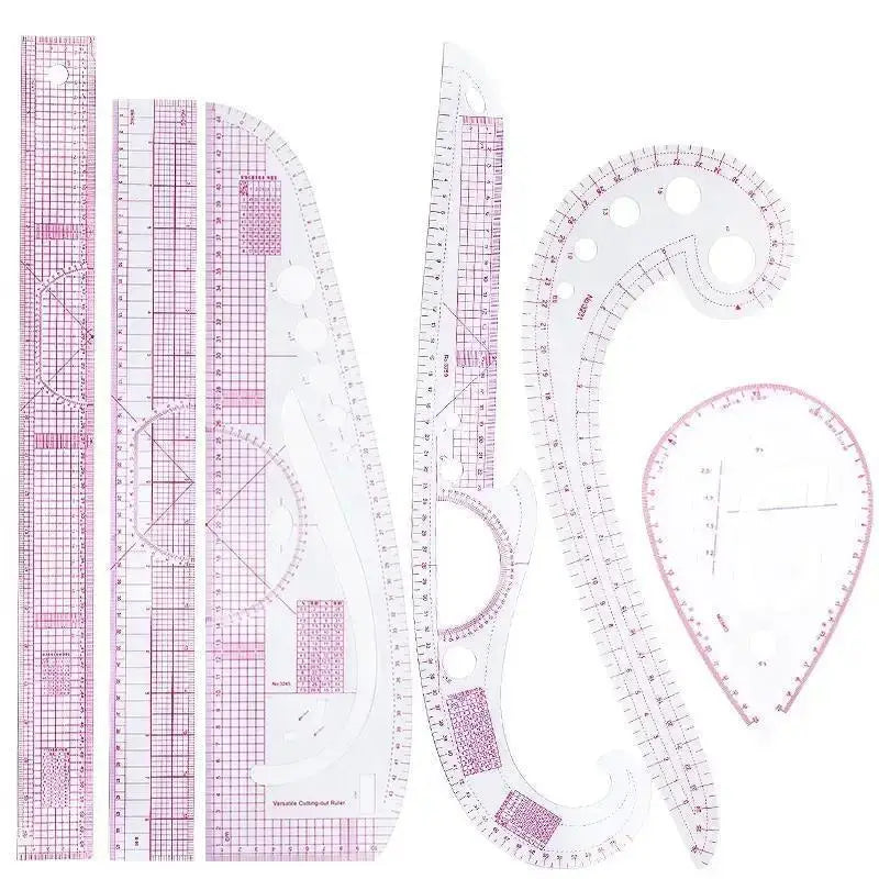 A set of six flexible sewing rulers in pink and white for curved stitching and pattern making.