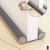A close-up view of a door and window sealing strip being installed on a white door frame, showing the metal fitting and foam 