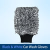 A pair of black and white car wash gloves with a fluffy texture shown against a light blue background.