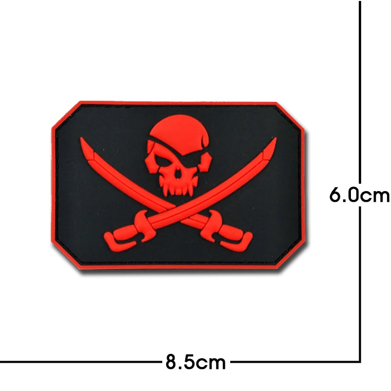 A black embroidered patch featuring a red skull and crossed swords design.