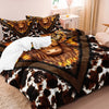 A bed featuring a Highland cow print duvet cover and pillowcases with a gold and brown pattern.