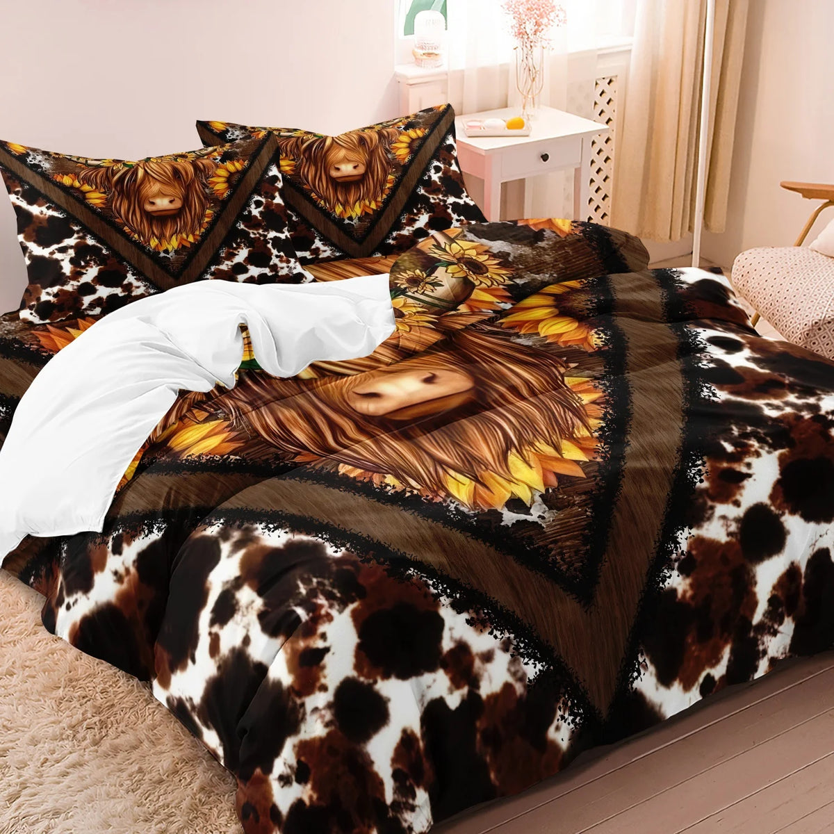 A bed featuring a Highland cow print duvet cover and pillowcases with a gold and brown pattern.