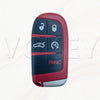 A red and black replacement smart key shell for Dodge Challenger and Charger models, showing various key cutouts.