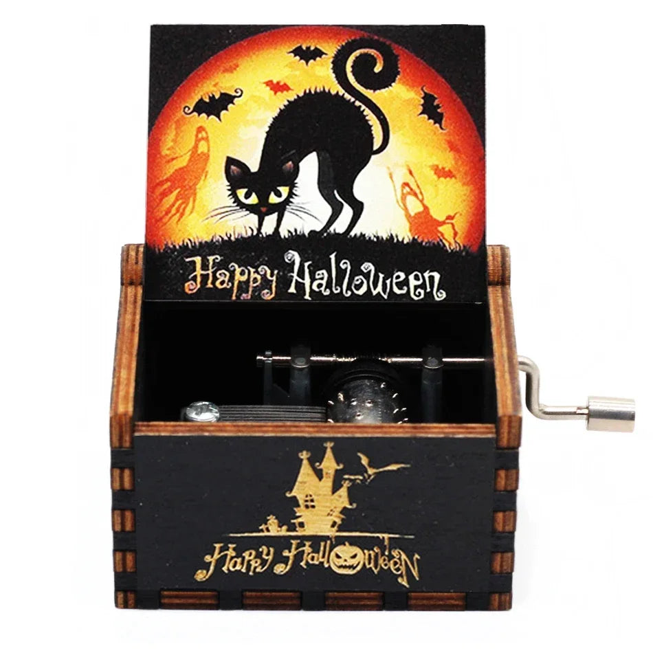 A wooden music box with a Halloween theme featuring a black cat silhouette against an orange moon background.