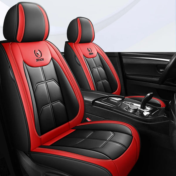 A close-up view of a black and red leather car seat cover with stitching, shown inside a vehicle cabin.