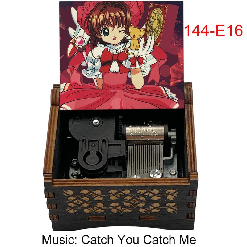 A wooden music box featuring a cardcaptor sakura theme, with an illustration of Sakura and a red box inside.