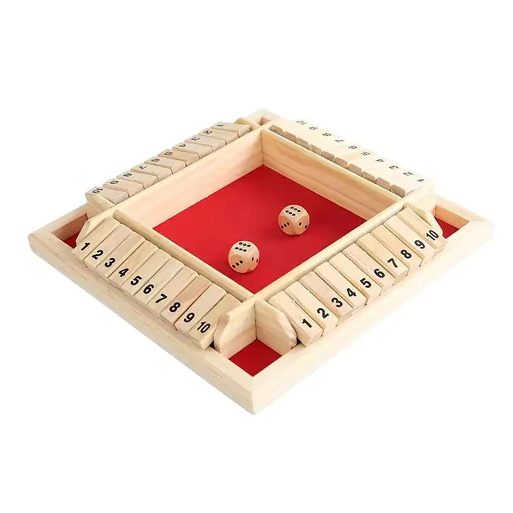 A wooden shut the box dice game board with numbered slots and dice inside