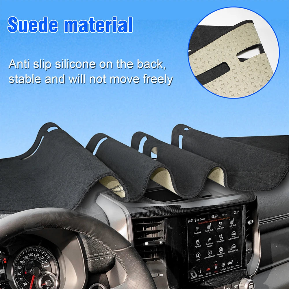 A black custom fit dash cover is shown installed in a vehicle dashboard, featuring an anti-slip silicone back.