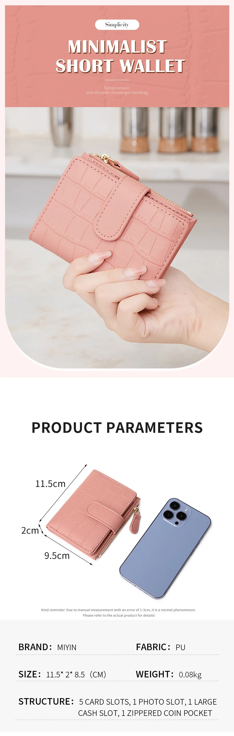 A pink minimalist short wallet is shown being held by a hand, next to a smartphone.