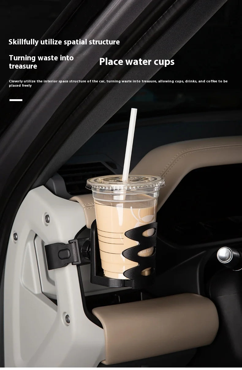 A magnetic car phone mount with a cup holder base is shown inside a car, holding a beverage cup.