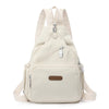 A beige waterproof nylon crossbody sling bag with adjustable straps and a flap closure.