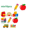 A set of ten iron-on patches featuring school-themed items like pencils, apples, and a school bus.
