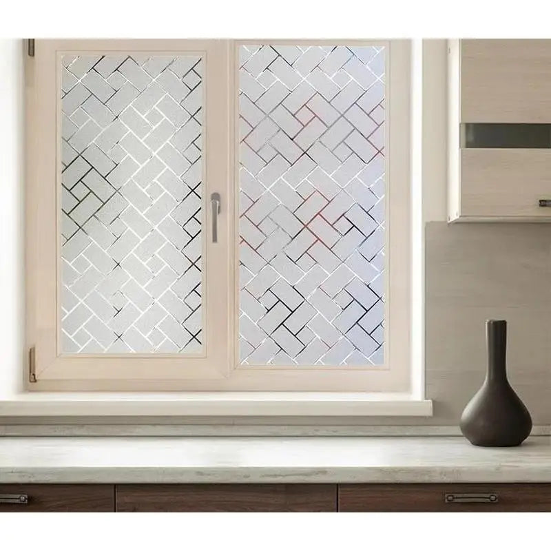 Decorative frosted window privacy film featuring a geometric pattern in white and red tones.