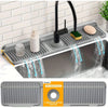 A kitchen sink splash guard featuring a 7 degree slope design for fast drying.