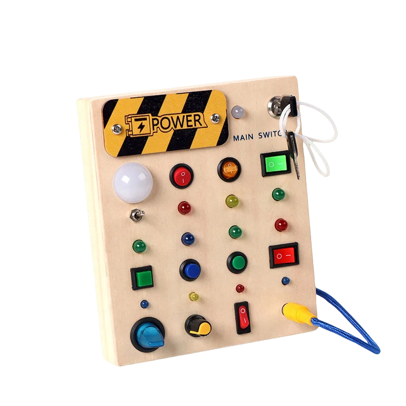 A wooden busy board with various buttons, lights, and switches for a Montessori sensory toy.