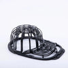 Black cap protector cage designed to prevent damage to a washing machine cap.