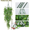 A long, green artificial hanging vine with small leaves is shown against a white background.