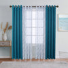 A set of dual layer window curtains featuring a sheer blue patterned layer and solid teal blackout panels.