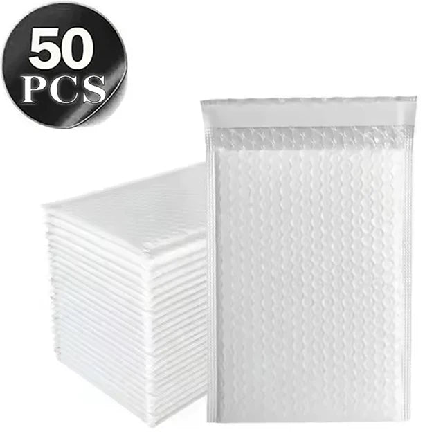 A stack of 50 clear plastic bubble mailers with self-sealing adhesive.