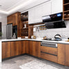 Modern kitchen featuring wood grain cabinetry, white cabinets, and a black range hood above a speckled countertop.
