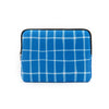 A blue and white plaid laptop sleeve with a black zipper closure.