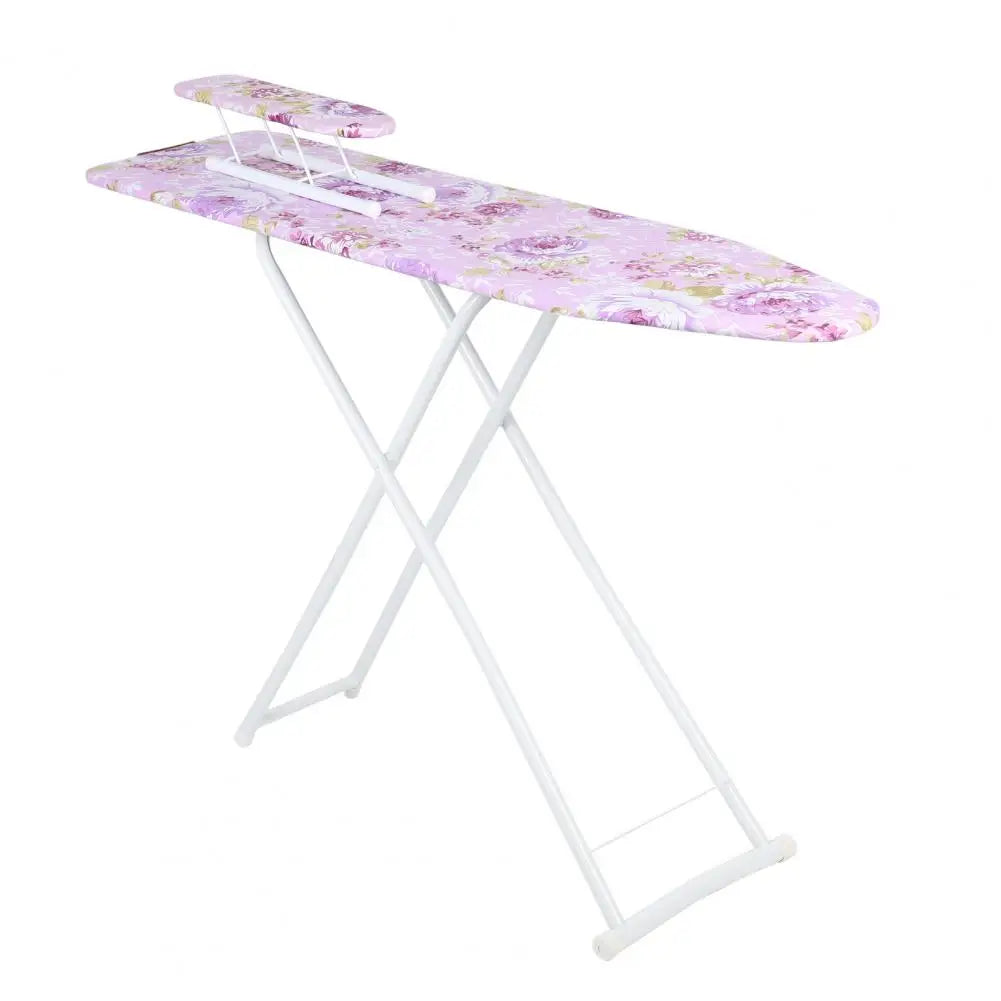 A full-size foldable ironing board with a purple floral cover and white metal frame.