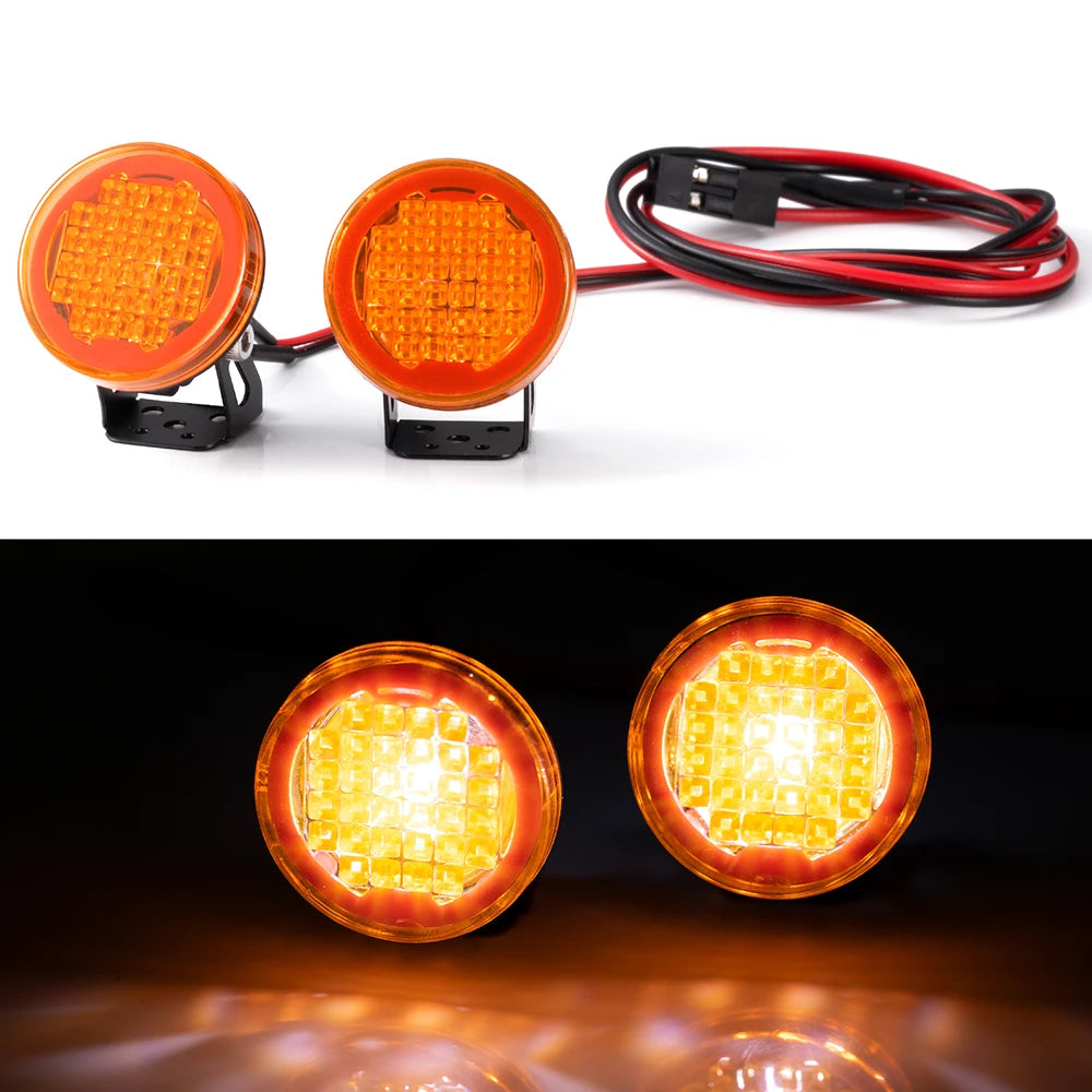 Two round orange LED headlight and spotlight units for RC crawler trucks