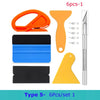 A set of six vinyl wrap and film application tools including an orange tool, a yellow spatula, black and blue pads, and a sil