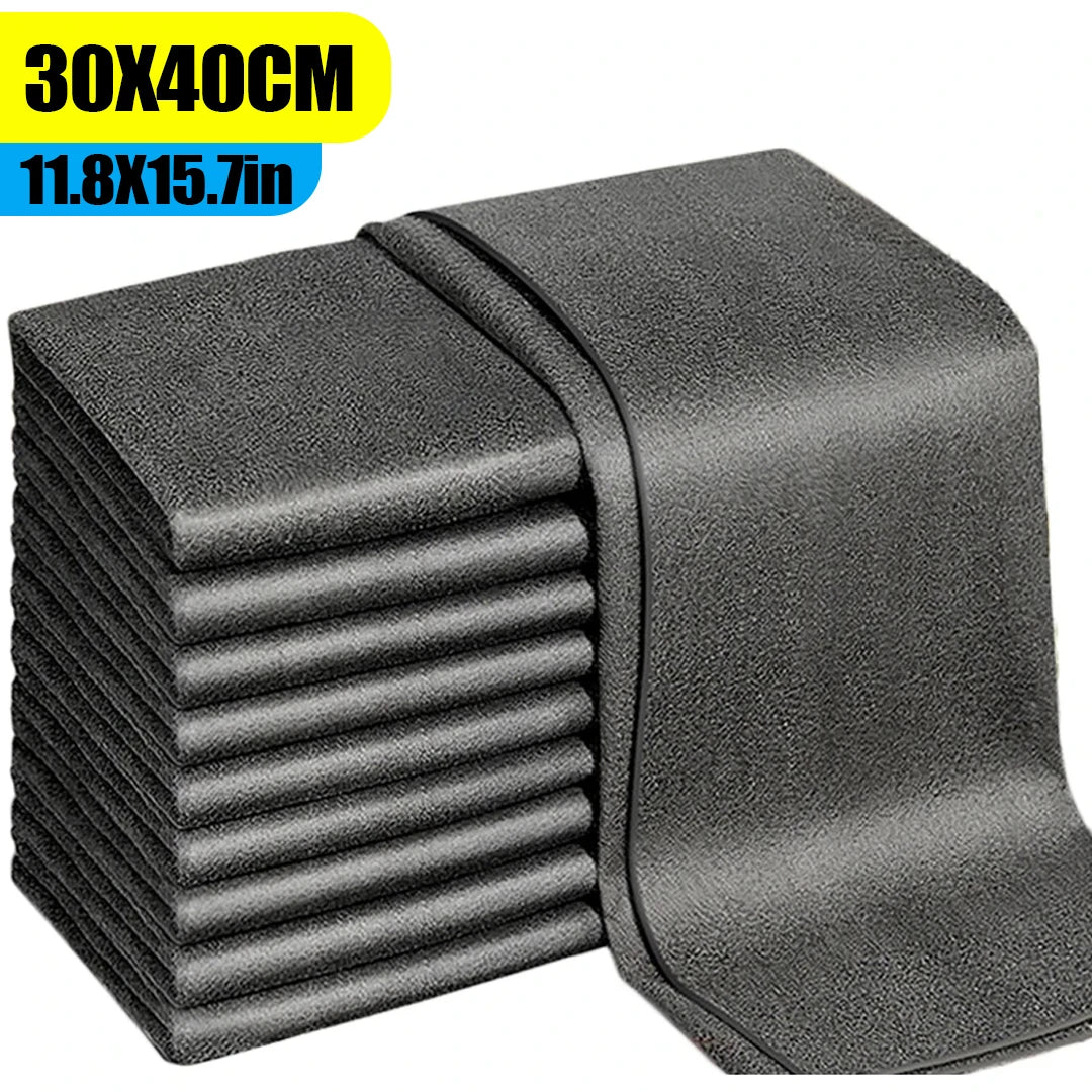 A stack of dark gray reusable microfiber glass cleaning cloths.