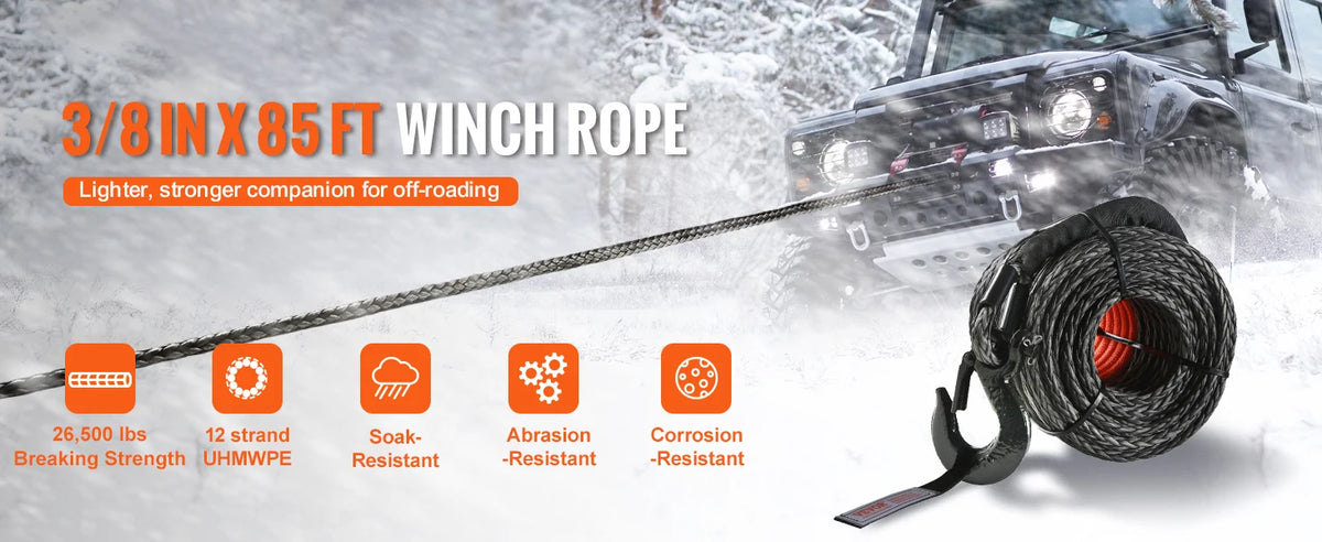 A close-up of a 3/8 inch by 85 foot winch rope with a forged hook, shown in an off-road snowy environment.