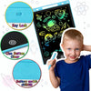 A child holds an LCD writing tablet with a key lock feature and battery model CR2025.