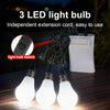 Three LED light bulbs hanging from an extension cord and a white power bank.