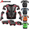 A set of kids motocross body armor featuring a chest protector, elbow pads, and knee pads in various colors.