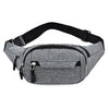 Gray canvas waist pack with black adjustable strap and multiple zippered pockets