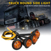 A bundle of yellow and black LED round side marker lights for trucks and trailers