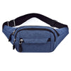 A navy blue canvas waist pack with adjustable straps and multiple zippered pockets.