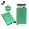 A green slim metal RFID blocking card holder with a pop-up design and a credit card inside.