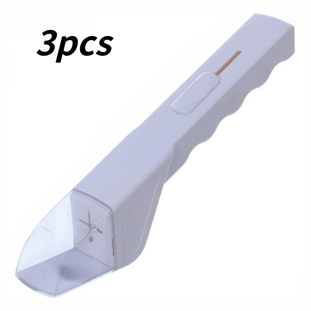 A white handheld insect catcher clamp tool with a clear plastic tip and a thin metal probe.