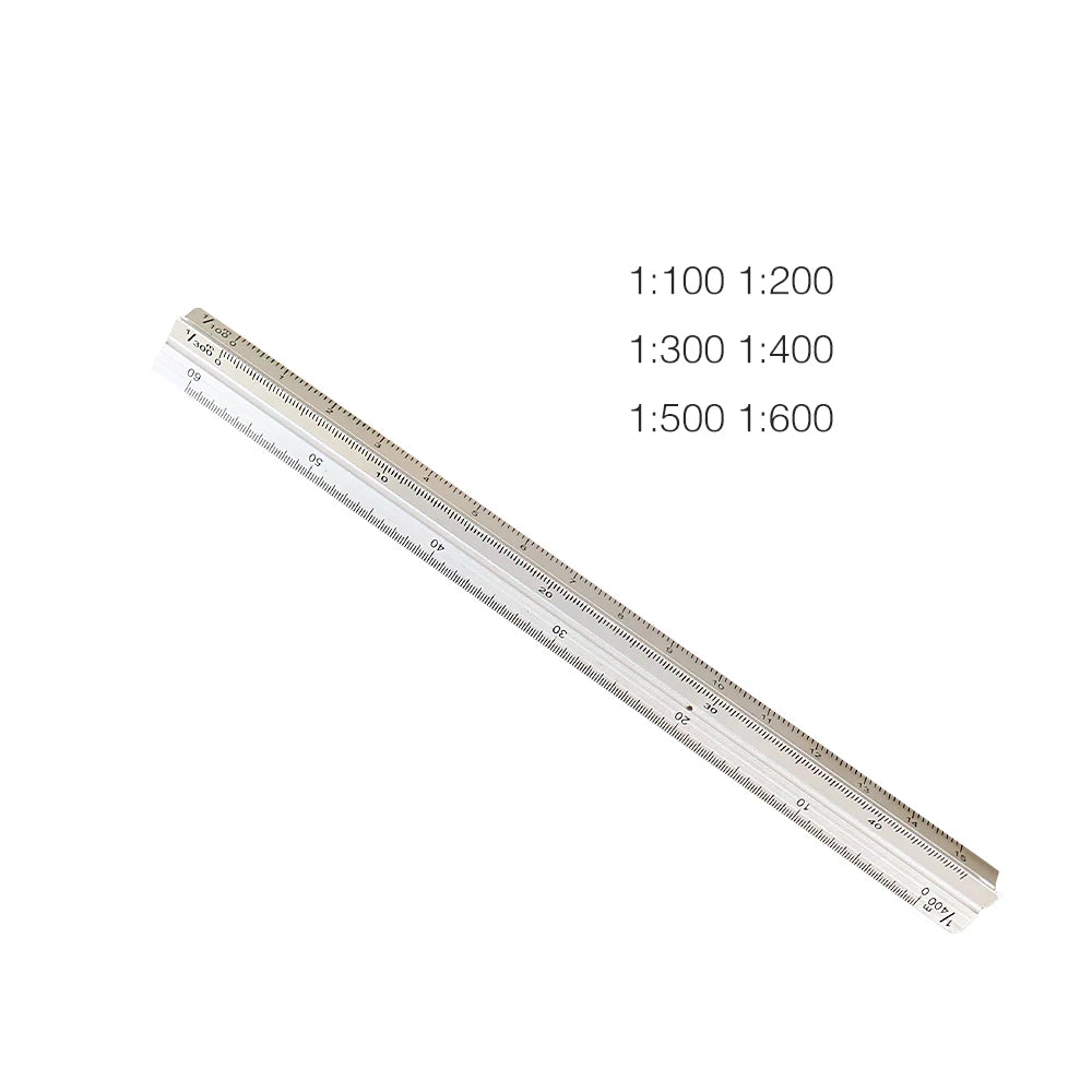 A metal triangular scale ruler showing various magnification ratios like 1:100 to 1:600 for precision marking.