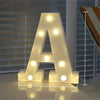 A letter night light shaped like the letter A, illuminated with warm white LEDs.