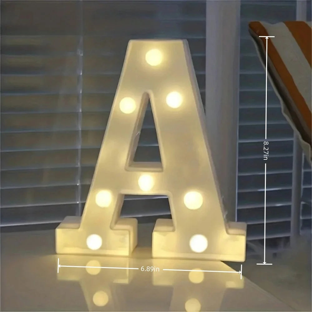 A letter night light shaped like the letter A, illuminated with warm white LEDs.