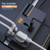A black car inverter device with a digital display showing 120 volts and various cables and plugs.