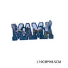 A dark blue embroidered patch spelling out the word MAMI with birds integrated into the letters.