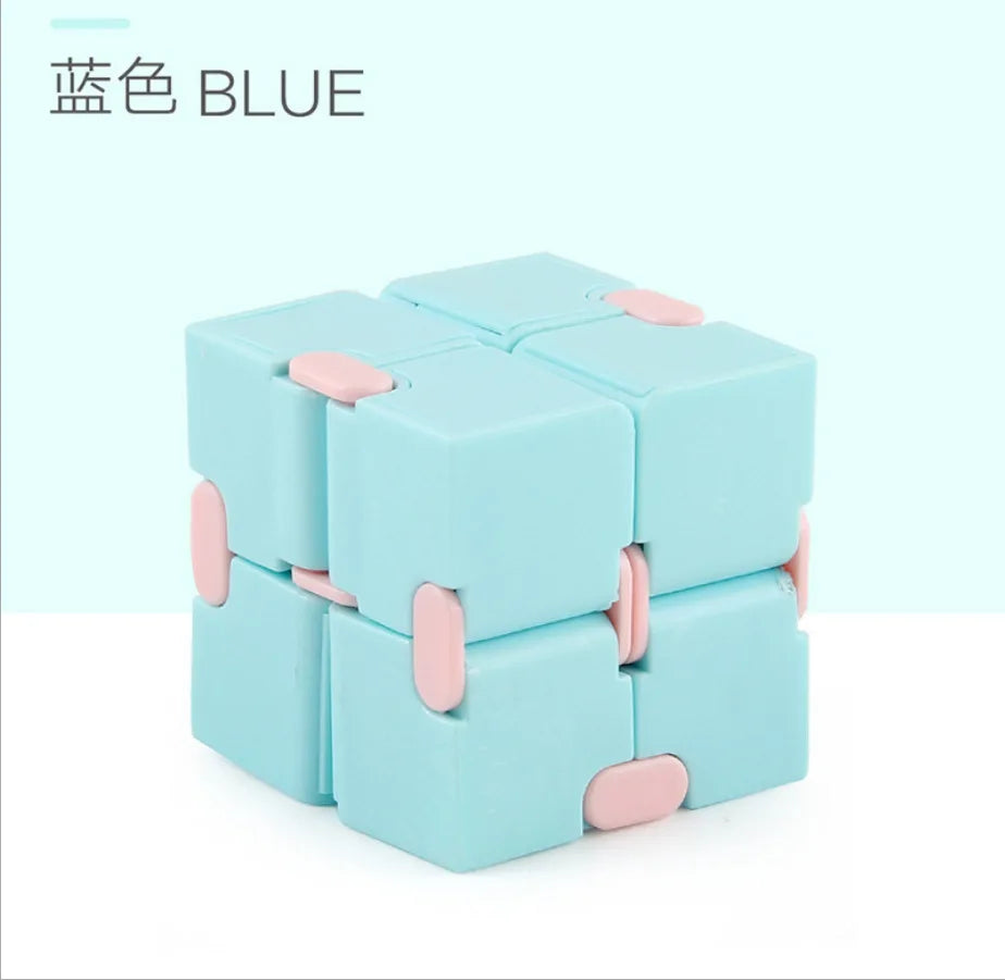 A light blue infinity magic cube fidget toy with pink accents.